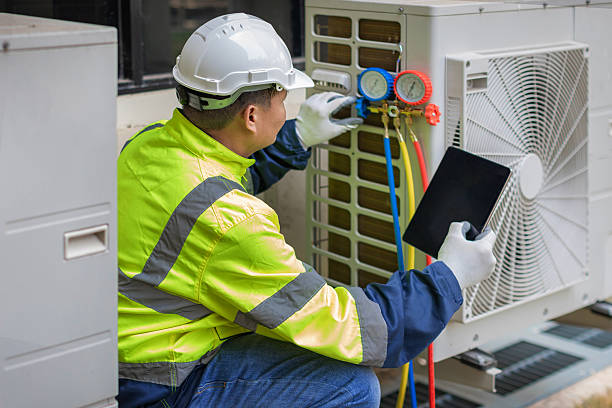 Professional Heat Pump Repair technician working in Lyons, WI